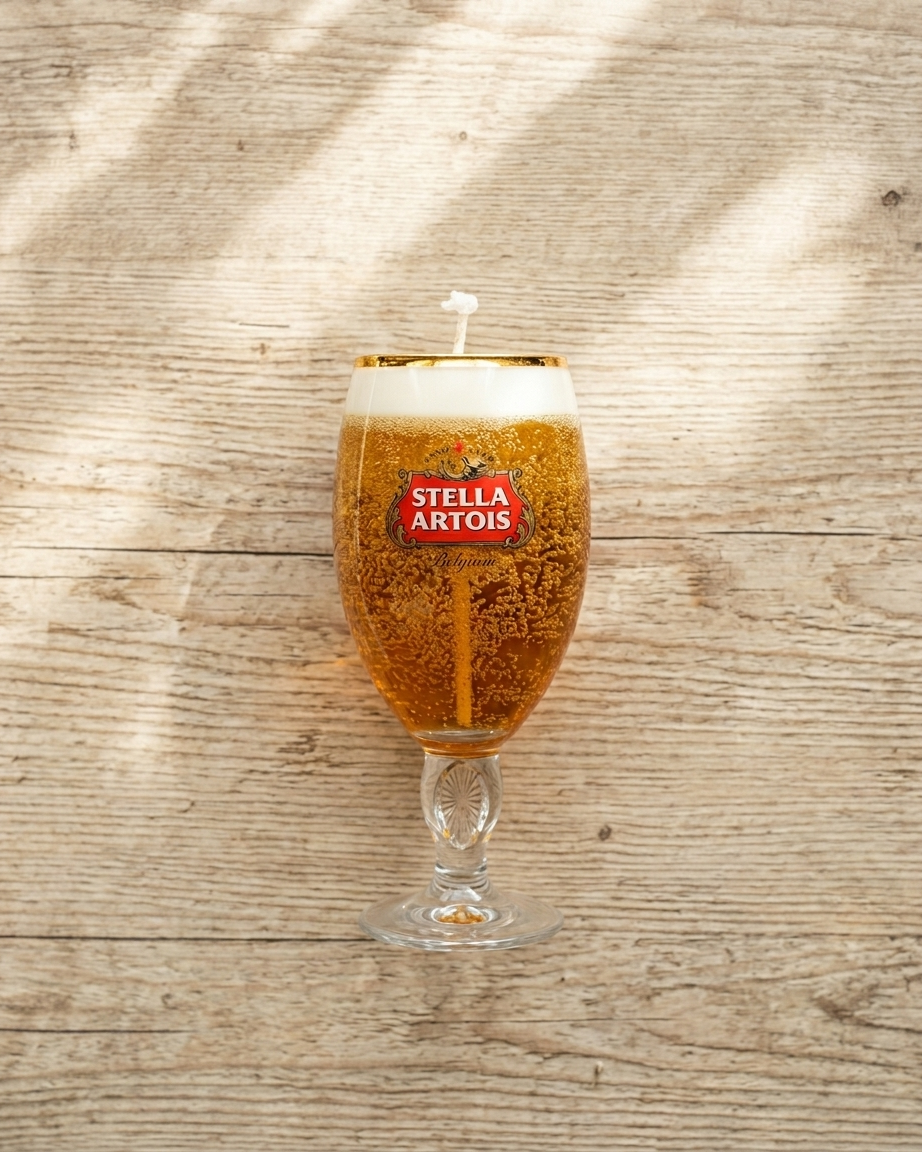 Stella Artois beer glass on a wooden surface